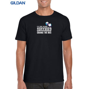 Mockup on a male model wearing a black Gildan t-shirt featuring the 'If at first you don't succeed, change the dice' design. Perfect for table top gamers and fantasy football coaches.