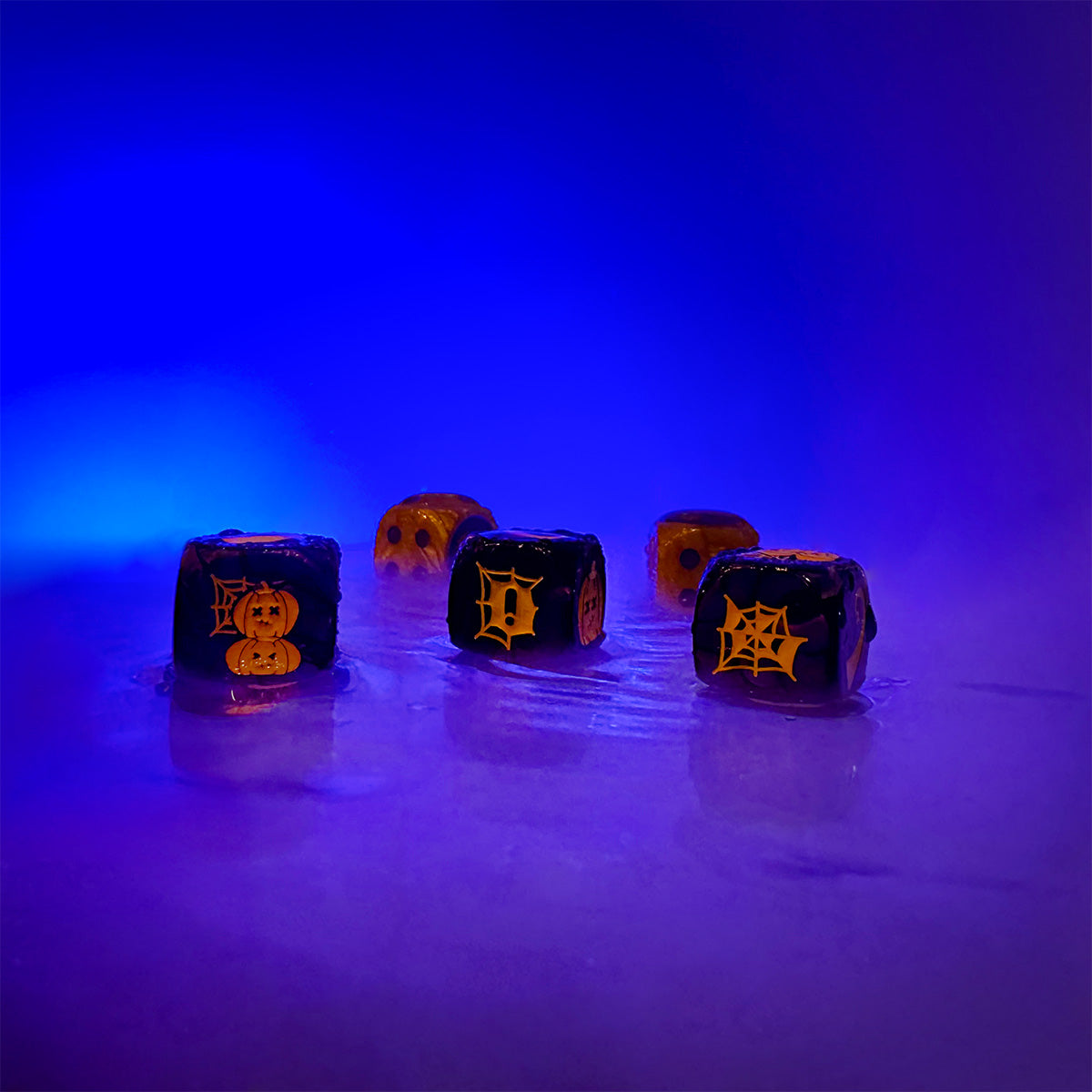 Purple acrylic 16mm set of three block dice with Orange infill with orange D6 dot dice dice